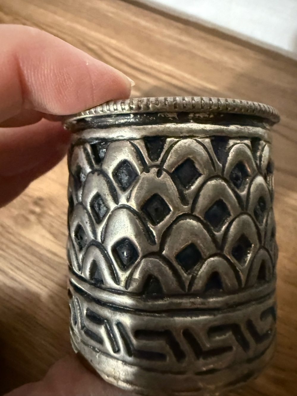 Glass and metal votive candle holder